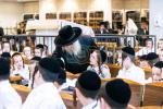 The Satmar Rebbe Shlit"a at Shacharis Davening and Learning with the Children in Montreal