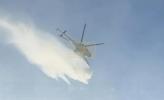 Main image for Devastating Russian Assault: Helicopters Rush to Extinguish Kyiv Fires After Missile Onslaught.