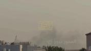 Main image for ​Smoke Rises Above Mostly Empty US Fifth Fleet Headquarters in Bahrain Following Iranian Missile Attack