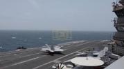 Main image for Carrier Might on Full Display: U.S. Sailors and F/A-18 Jets Roar into Action Aboard USS George H.W. Bush.