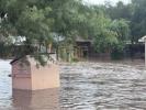 Main image for Texas Town Completely Cut Off as 4 Feet of Raging Floodwater Buries Uvalde Street.