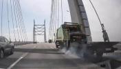 Main image for Driver Goes Viral After Flawlessly Towing Dead Garbage Truck Off Bridge
