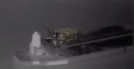 Main image for IRGC Navy drone hits a tanker in the Strait of Hormuz.