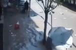 Main image for CCTV Footage Captures Chaotic Moment Floodwaters Engulf Street and Residents in China.
