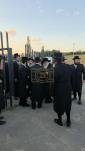 The Toldos Aharon Rebbe Shlit"a wishing Hagaon Hechasid R' Yosef Chaim Greenwald Shlit"a "gepoilt alles guts" after the Hisorerus Rachamim gathering at the tziyon in Liska