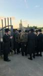 The Toldos Aharon Rebbe Shlit"a wishing Hagaon Hechasid R' Yosef Chaim Greenwald Shlit"a "gepoilt alles guts" after the Hisorerus Rachamim gathering at the tziyon in Liska