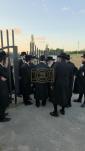 The Toldos Aharon Rebbe Shlit"a wishing Hagaon Hechasid R' Yosef Chaim Greenwald Shlit"a "gepoilt alles guts" after the Hisorerus Rachamim gathering at the tziyon in Liska