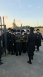 The Toldos Aharon Rebbe Shlit"a wishing Hagaon Hechasid R' Yosef Chaim Greenwald Shlit"a "gepoilt alles guts" after the Hisorerus Rachamim gathering at the tziyon in Liska