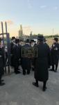 The Toldos Aharon Rebbe Shlit"a wishing Hagaon Hechasid R' Yosef Chaim Greenwald Shlit"a "gepoilt alles guts" after the Hisorerus Rachamim gathering at the tziyon in Liska