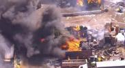 Main image for Huge Smoke Plume Rises Over Corby as Recycling Fire Rages.