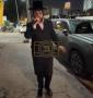 Main image for Singer Motty Vizel Surprises the Crowd Outside the Hall Together With Srulik Stern Before Going Into a Farbrengen