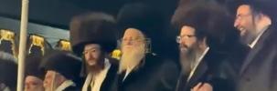 Main image for First Video of the Dancing at the End of the Chuppah in Skver - Zvhil - Modzitz - Lizhensk - Zutchka - Halmin. The Grandfather, the Skverer Rebbe Shlit"a, is Currently Conducting a Tish for the Simcha at His Residence with a Small Group of Mekuravim.