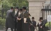 Main image for UPDATE: Rabbonim are welcomed by Asken Yossi Gestetner as they arrive to The White House West Wing entrance, near the Oval Office.