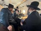 The Satmar Rebbe Shlit"a on the Plane to Washington D.C. for a Visit to the White House