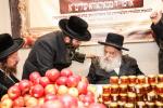 The Makava Gaavad Shlit"a Blesses the Apples and Honey for the Girls of 'Bayis Lepleitos'