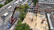 Drone Photos Yesterday Afternoon During the Construction of the Massive Sukkah for the Uplifting Tishin in Satmar in the Courtyard of the Talmud Torah Vayoel Moshe Building