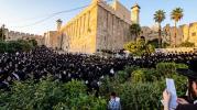 Main image for Karliner Chassidim Davening with Their Famous Fiery Hislahavus and Loud Voices, Last Night at the Me'aras HaMachpelah in Chevron.