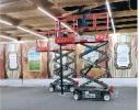 Main image for Placing the Schach on the Gigantic Sukkah at the Satmar Monsey Beis Medrash Hagadol