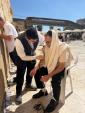 Main image for Binyamin Chasin at the Kosel Upon Arriving in Yerushalayim, After Being Freed From Iraqi Prison Following 11 Years of Languishing in Captivity