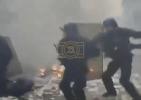 Main image for POLICE FINALLY ARRIVE: Riot Officers Charge Through Smoke After Chaotic French Protests