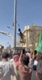 Main image for PEACE SQUARE CEREMONY: Thousands Watch Syrian Flag Raise in Last Stronghold