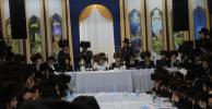 Main image for The Skulener Rebbe of Lakewood Shlit"a Seen in Fiery Rikudim During the Simchas Beis Hashoeiva on Leil Ushpiza DeMoshe