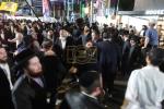 Until Dawn: Tens of Thousands of Yidden Rejoice in the Simchas HaChag at the Central Simchas Beis Hashoeiva on the Streets of Crown Heights in Front of Central Chabad Headquarters
