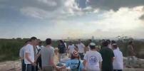 Main image for Yeshiva Students Gather for Rosh Chodesh Tefillos at Historic Tel Akko