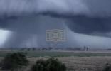 Main image for APOCALYPSE ROLLING IN: Giant Shelf Cloud Darkens Rural Uruguay Roads