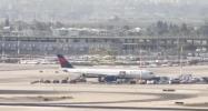 Main image for REMOTE STAND LOCKDOWN: Delta Passengers Evacuated As Security Hunts Bomb On New York Flight