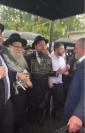 Main image for Rain Fails to Dampen Spirits at Hachnasas Sefer Torah Procession