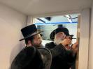 The Dushinskya Rebbe Shlit"a at a Kvias Mezuzah at the New Chaverim Headquarters in Williamsburg