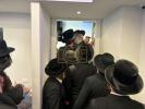 The Dushinskya Rebbe Shlit"a at a Kvias Mezuzah at the New Chaverim Headquarters in Williamsburg