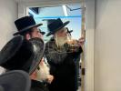 The Dushinskya Rebbe Shlit"a at a Kvias Mezuzah at the New Chaverim Headquarters in Williamsburg