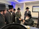 The Dushinskya Rebbe Shlit"a at a Kvias Mezuzah at the New Chaverim Headquarters in Williamsburg