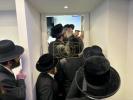 The Dushinskya Rebbe Shlit"a at a Kvias Mezuzah at the New Chaverim Headquarters in Williamsburg
