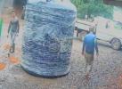 Main image for 🤣&nbsp;ENDLESS CHASE GOES VIRAL: Two Men Circle Giant Water Tank, Never Meeting