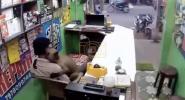 Main image for CAUGHT ON CCTV: Hungry Primate Embraces Indian Shopkeeper Over Late Lunch