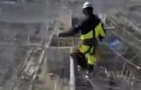 Main image for WIRES OVER THE WIRES: Russian Workers Climb High To Shield Power Site From Drones