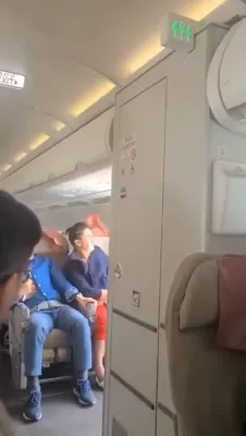 A mentally unstable person opens an airplane door mid landing 