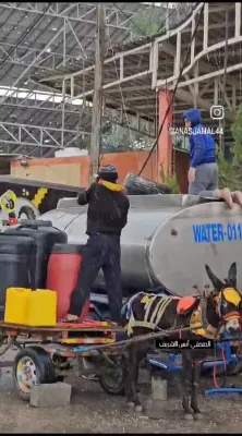 People get drinking water in Gaza 