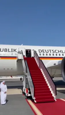 Scene as Qatar left the German president waiting at the door of his plane until a government official came welcome him.