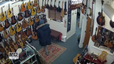 Surveillance Shows Brazen Mandolin Theft at Music Store.