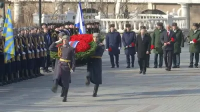 Vladimir Putin takes part in a ceremony as Russia marks 'Defender of the Fatherland' Day