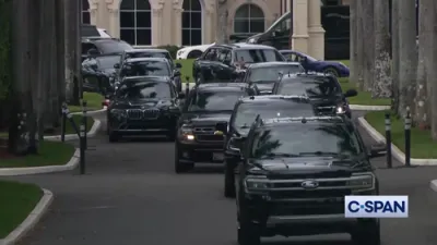 Trump gets out of Beast to recognize cheering supporters as motorcade exit West Palm Beach Golf Club