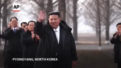 North Korea's Kim Jong Un watches groundbreaking for apartments on late father's birthday