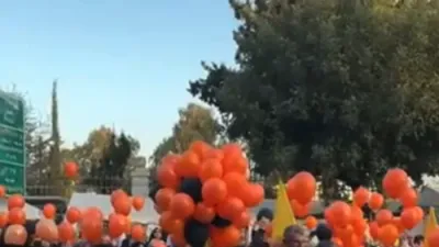 Orange Balloons Fill Jerusalem Sky in Tribute to Bibas Children
