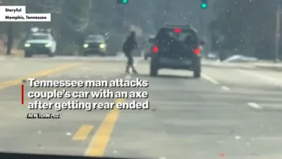 Man with Axe Attacks Car After Being Rear-Ended in Road Rage Incident