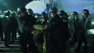 Over 200+ Alleged Venezuelan Gang Members Deported to El Salvador's Mega-Prison