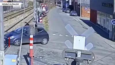 Close Call in Belgium: Two Flee Car Seconds Before Train Smashes Into It 